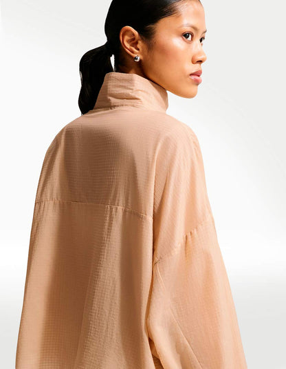 Chamarra Nike W NSW Ltwt Ripswr Café - Mujer