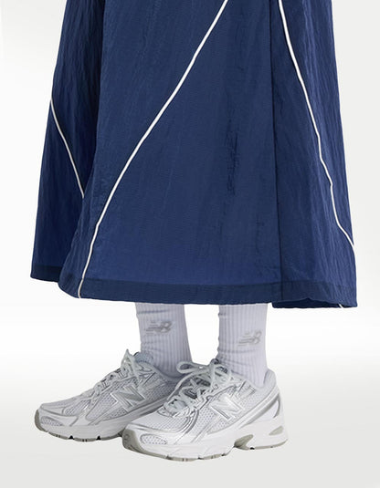 Falda New Balance Sport Legacy Azul - Mujer